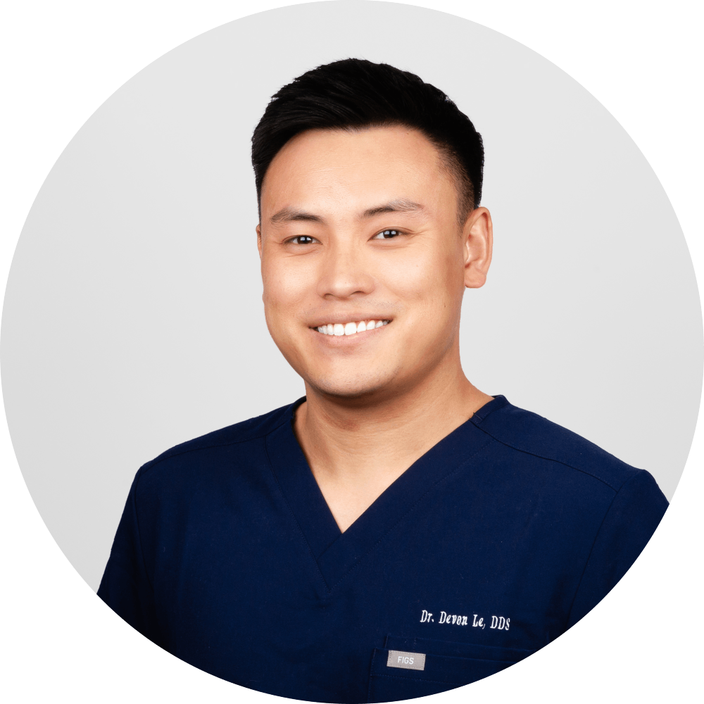 Dr. Devon Le, DDS, Owner and Dentist, Mt. Hermon Dental Care, Scotts Valley Dr. Devon Le, DDS, owner and dentist at Mt. Hermon Dental Care in Scotts Valley, CA, smiling in navy scrubs